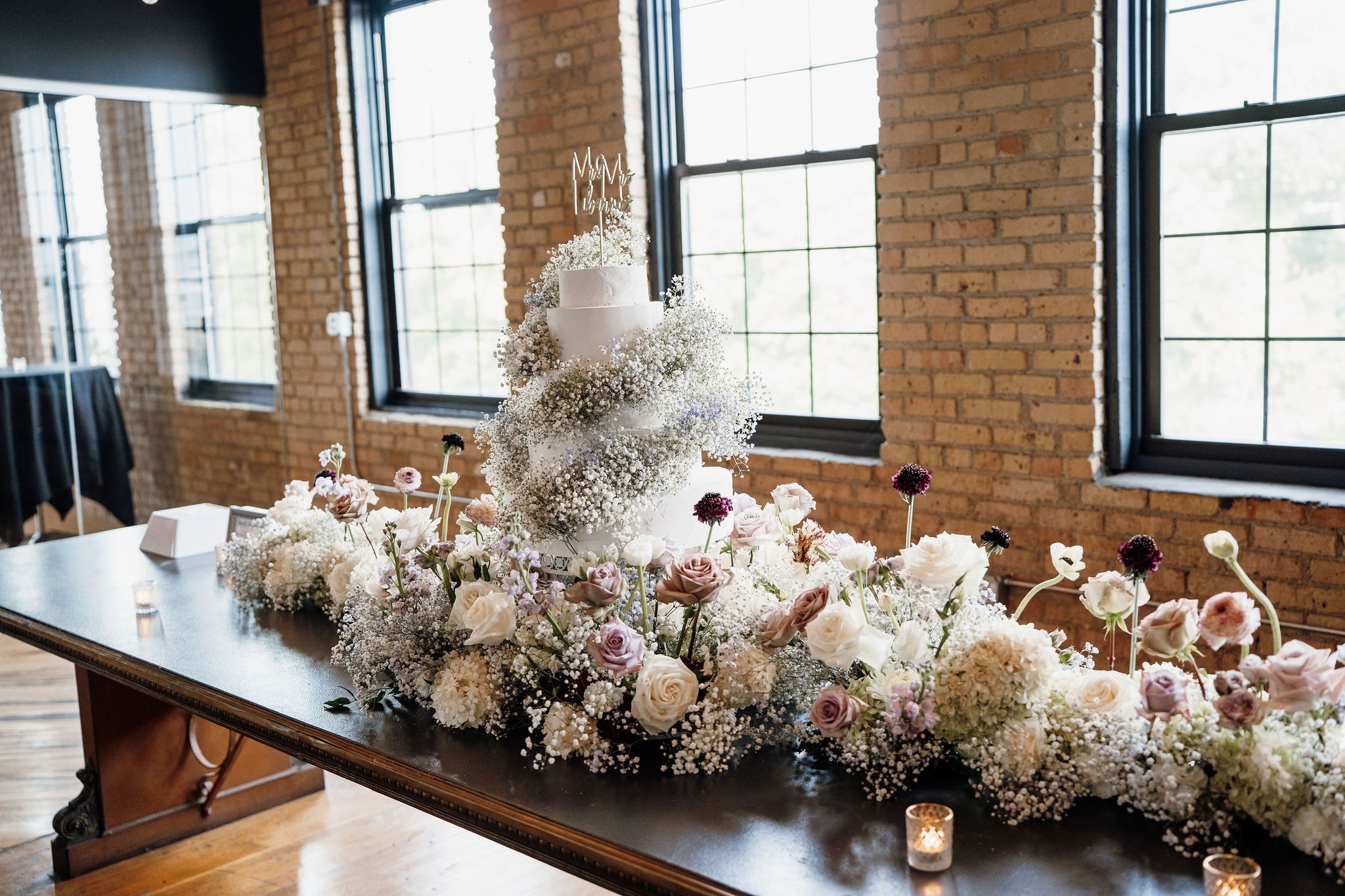 Bride holding bouquet with white anemones and burgundy scabiosa — Ana & Ramon at Solar Arts Building