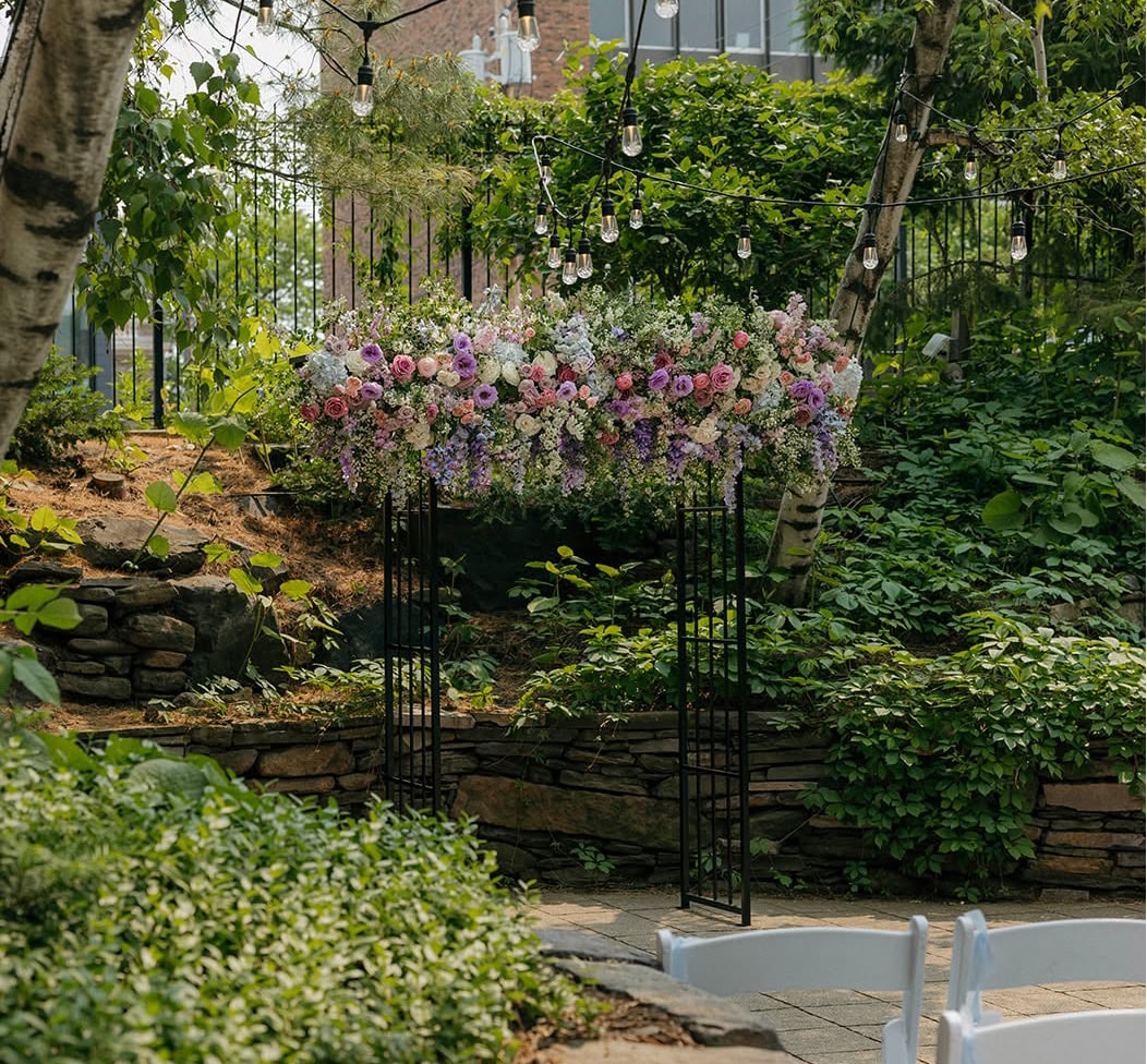 Elegant wedding reception table centerpiece — Van Dusen Mansion